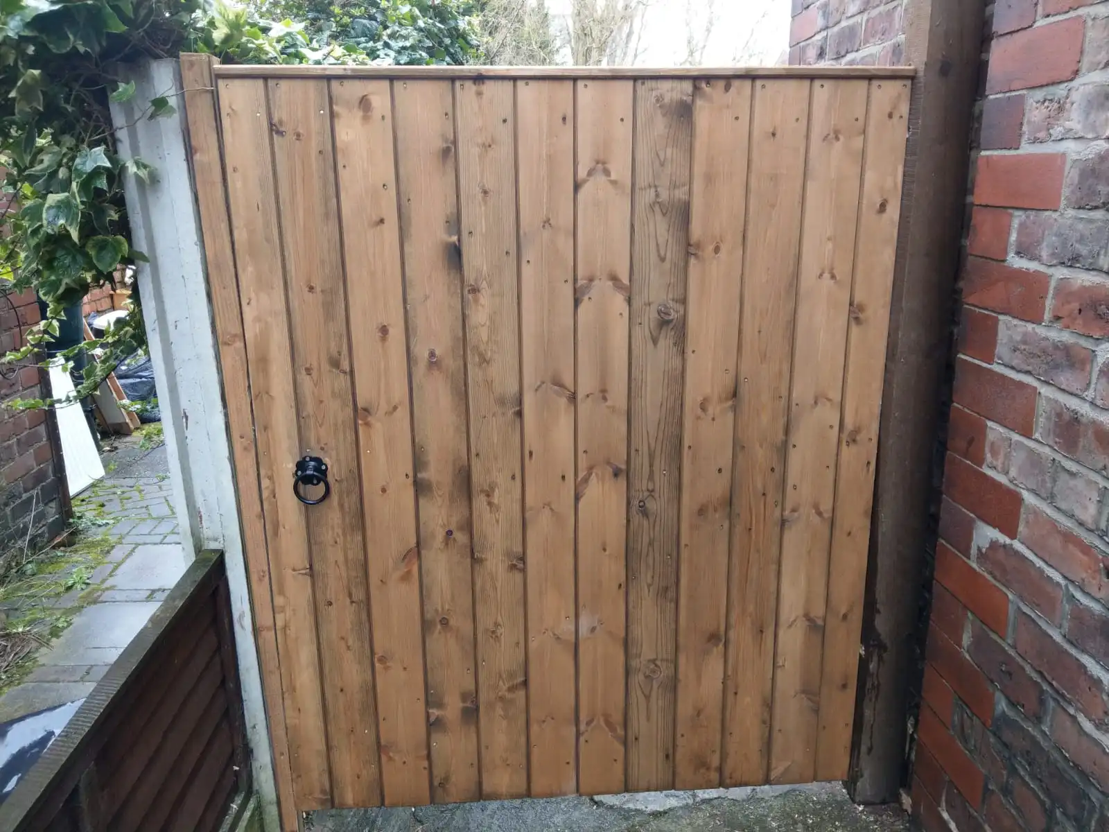 Complete garden fencing and gate replacement in sunny Altrincham property